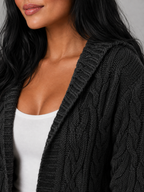 Women's hooded longline cable knit cardigan with patch pockets
