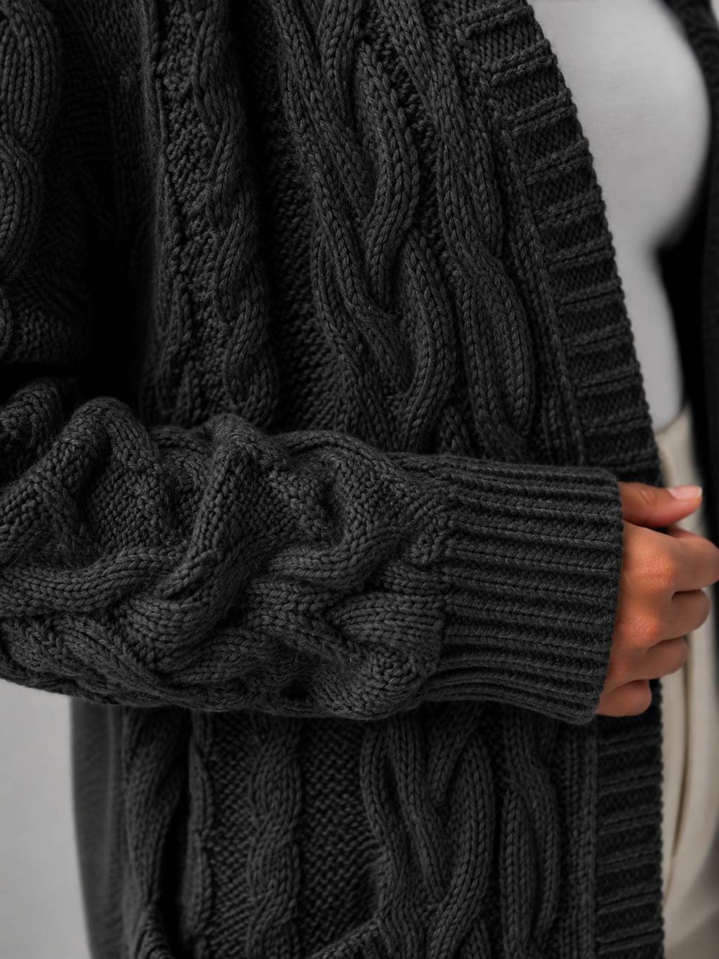 Women's hooded longline cable knit cardigan with patch pockets
