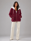 Women's sherpa-lined hooded padded jacket with a zip front