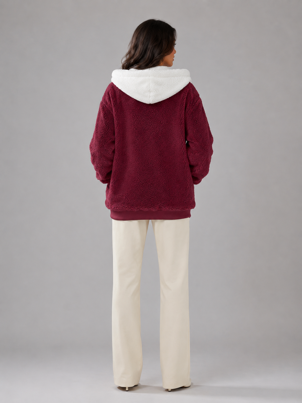 Women's sherpa-lined hooded padded jacket with a zip front
