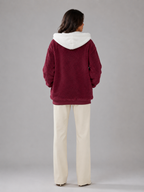 Women's sherpa-lined hooded padded jacket with a zip front