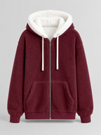 Women's sherpa-lined hooded padded jacket with a zip front