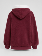 Women's sherpa-lined hooded padded jacket with a zip front