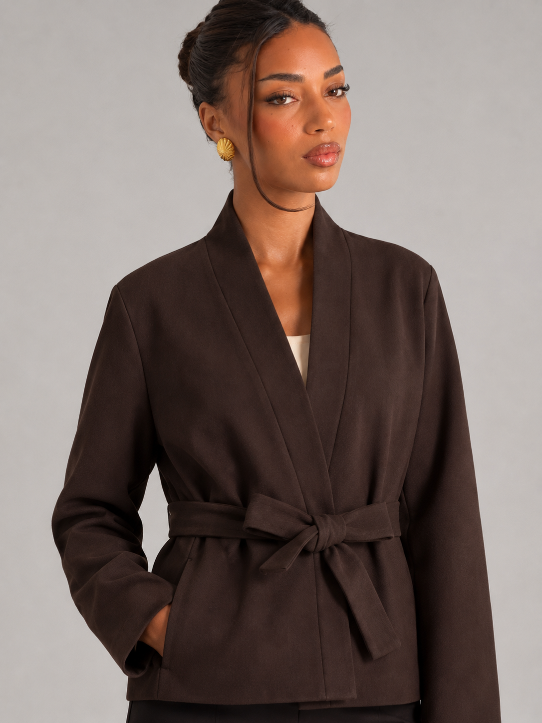 Women's belted wrap jacket