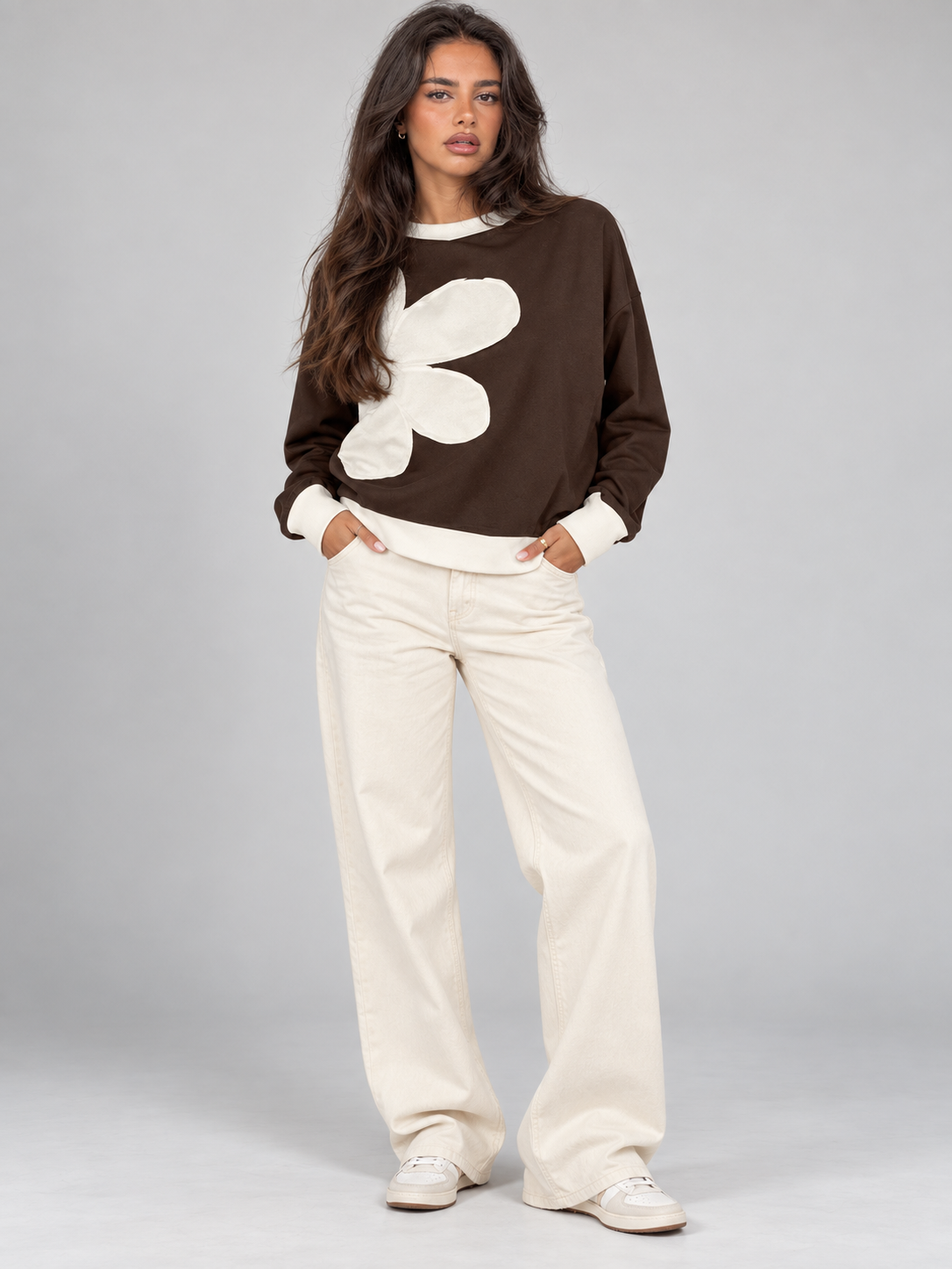 Women's sweatshirt with an oversized floral appliqué