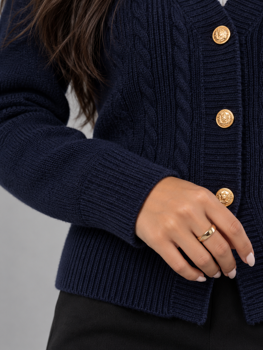 Women's cable knit cardigan with a deep V-neck and gold-tone buttons