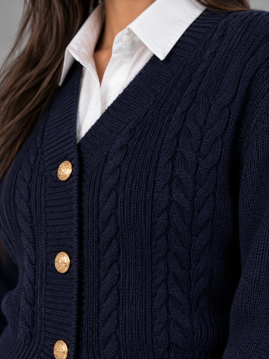 Women's cable knit cardigan with a deep V-neck and gold-tone buttons