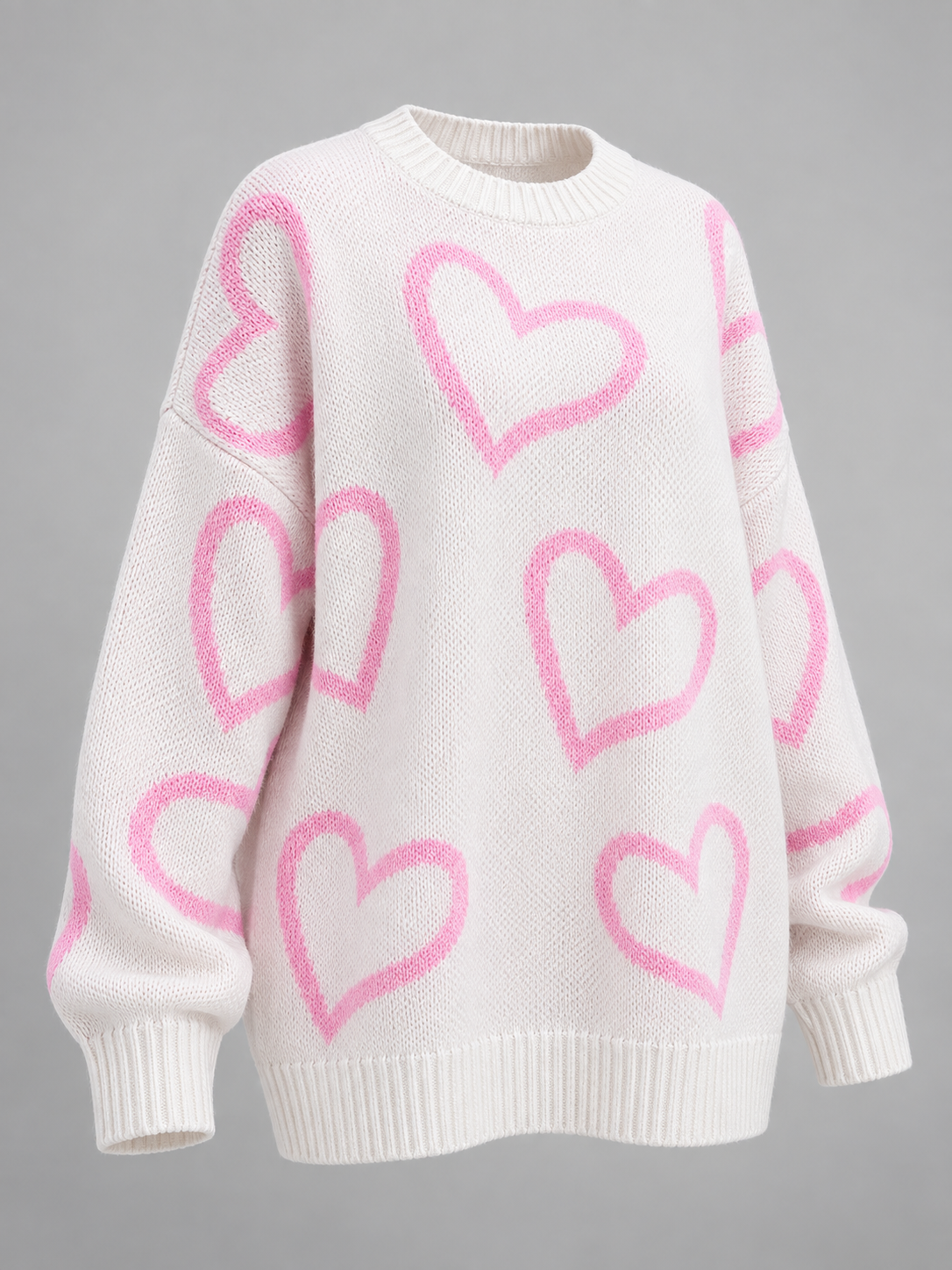 Women's oversized jumper with an all-over heart print