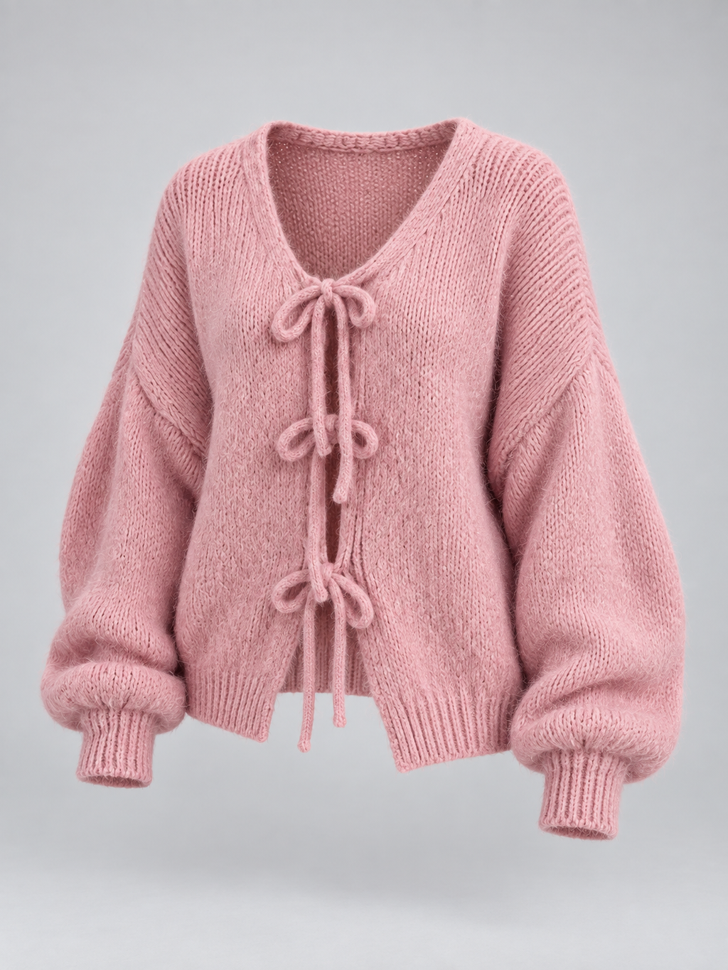 Women's open knit cardigan with tie-bow fastenings and balloon sleeves