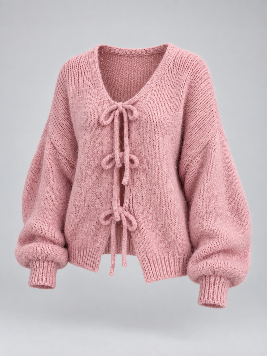 Women's open knit cardigan with tie-bow fastenings and balloon sleeves