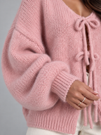 Women's open knit cardigan with tie-bow fastenings and balloon sleeves