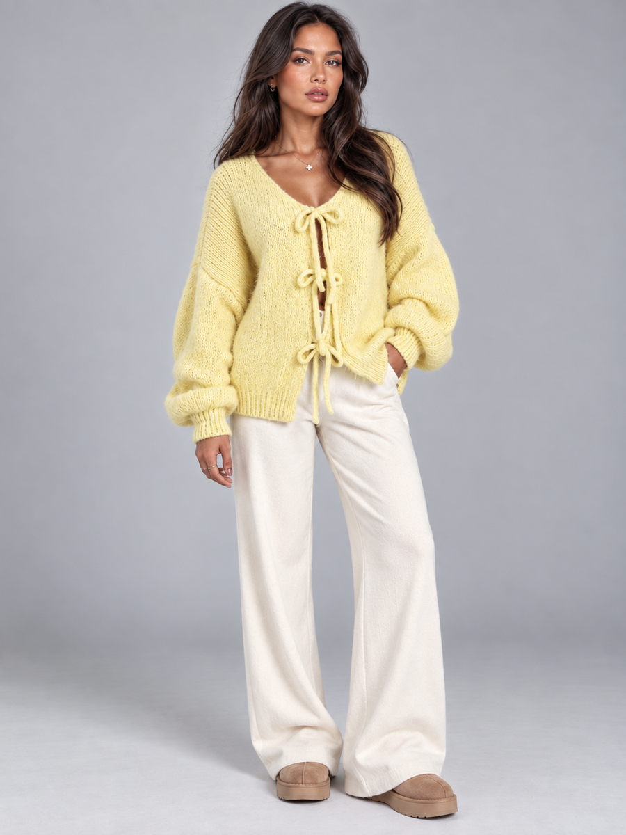 Women's open knit cardigan with tie-bow fastenings and balloon sleeves