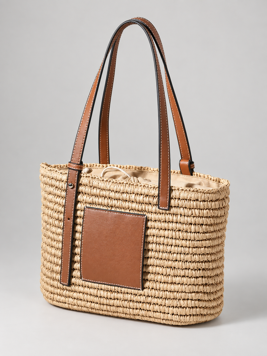 Women's woven straw tote bag with leather-look straps