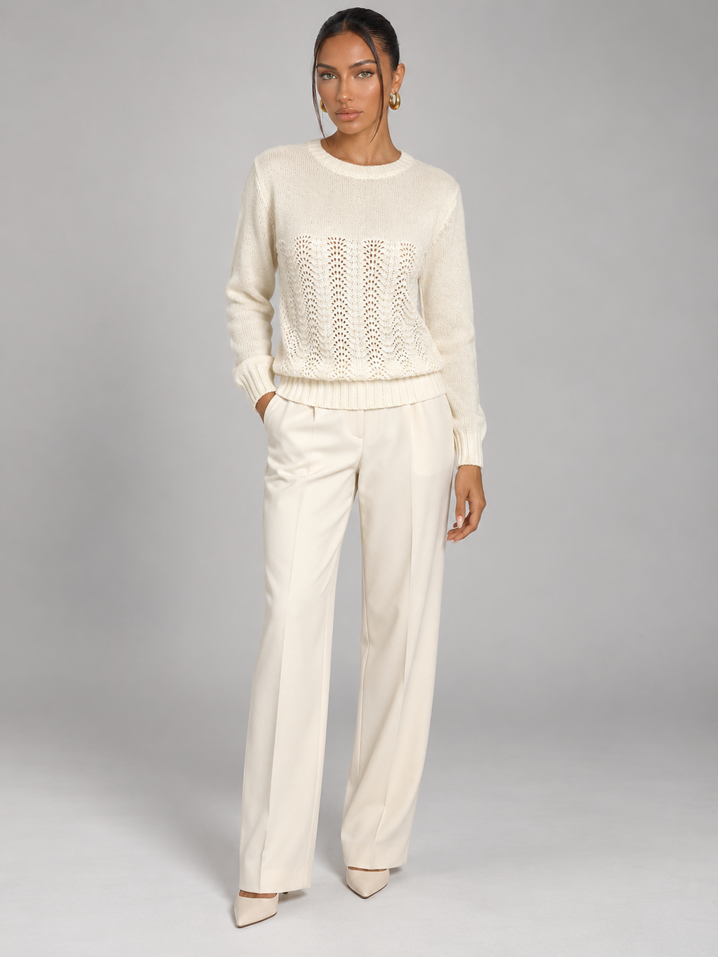 Women's pointelle open stitch knit jumper with a crew neck