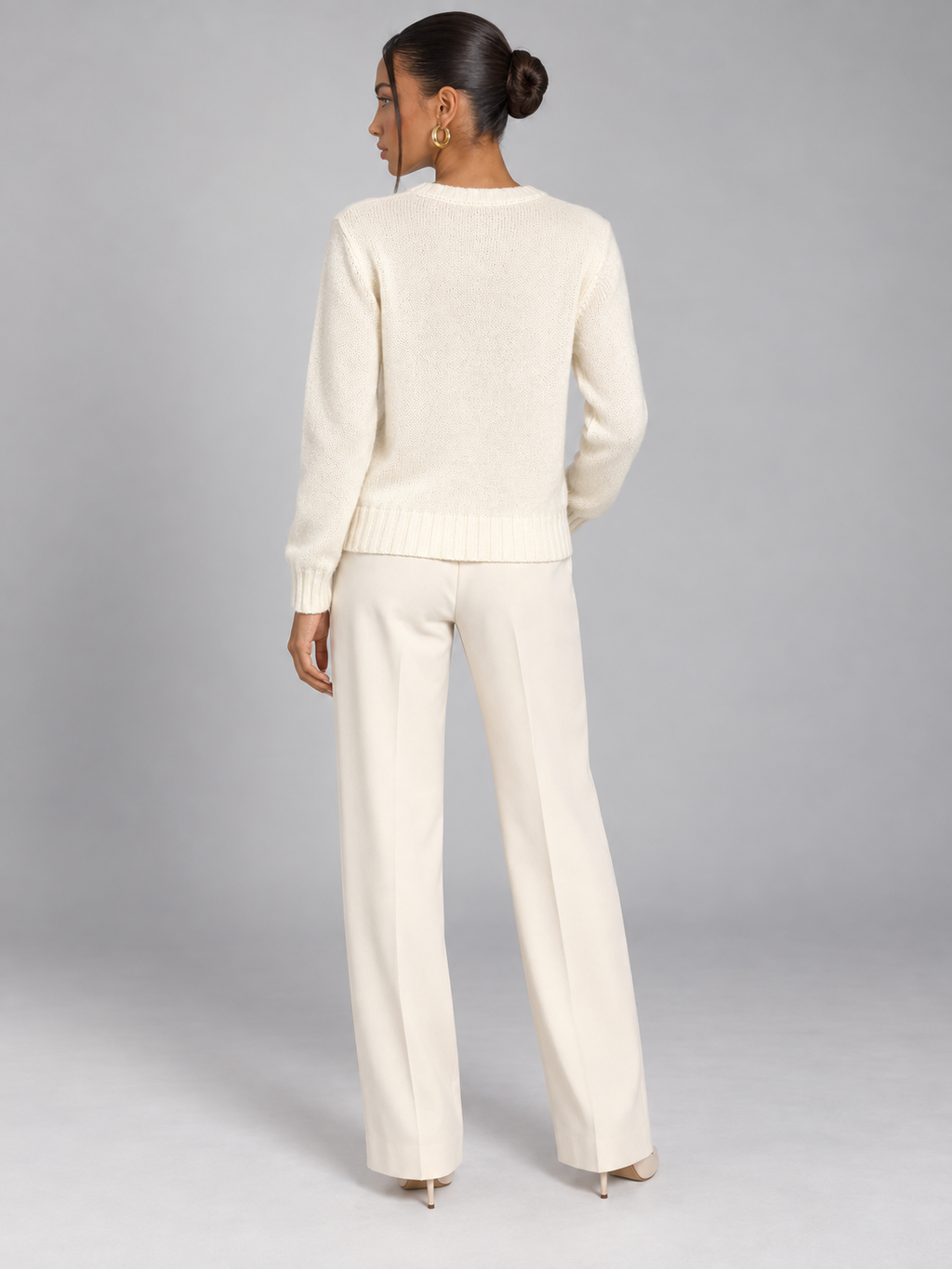 Women's pointelle open stitch knit jumper with a crew neck