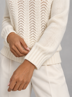 Women's pointelle open stitch knit jumper with a crew neck