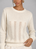 Women's pointelle open stitch knit jumper with a crew neck