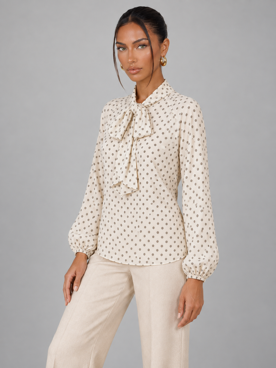 Women's polka dot blouse with a pussy bow tie neck