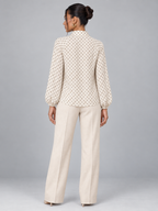 Women's polka dot blouse with a pussy bow tie neck