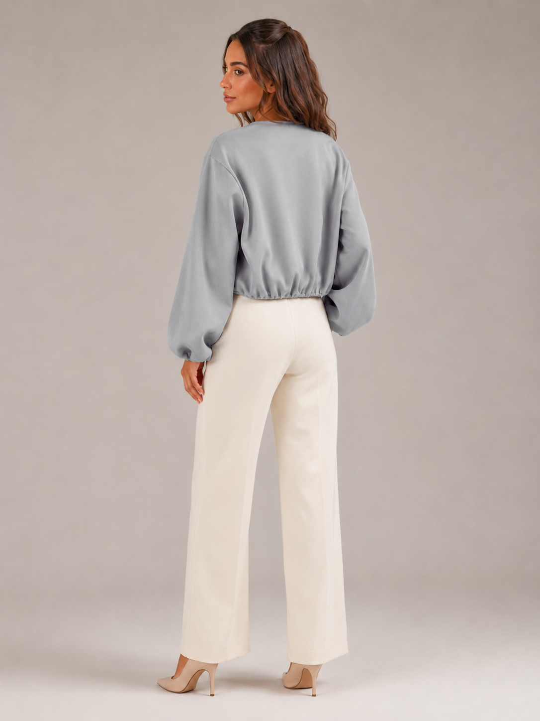 Women's cropped bomber jacket with balloon sleeves and a zip front