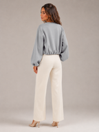 Women's cropped bomber jacket with balloon sleeves and a zip front