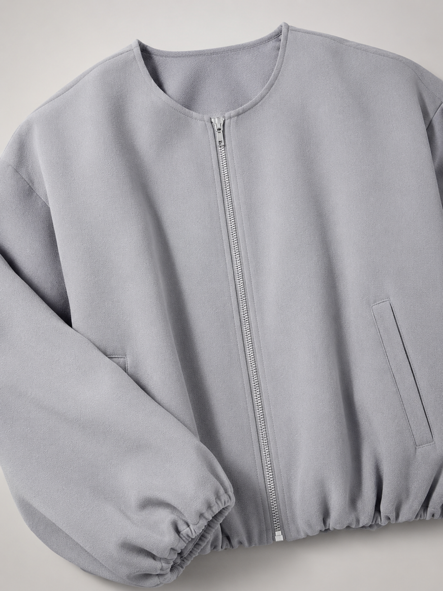 Women's cropped bomber jacket with balloon sleeves and a zip front