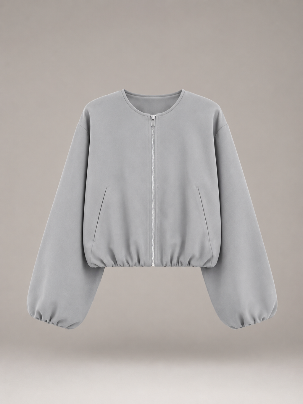 Women's cropped bomber jacket with balloon sleeves and a zip front