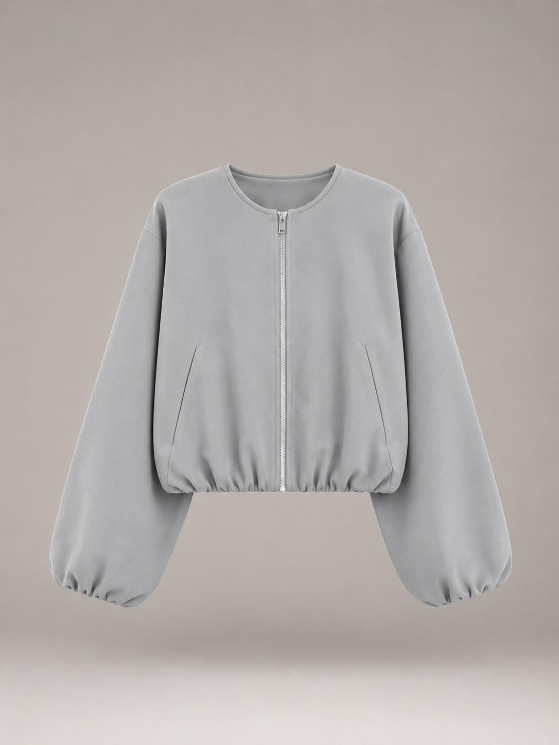 Women's cropped bomber jacket with balloon sleeves and a zip front