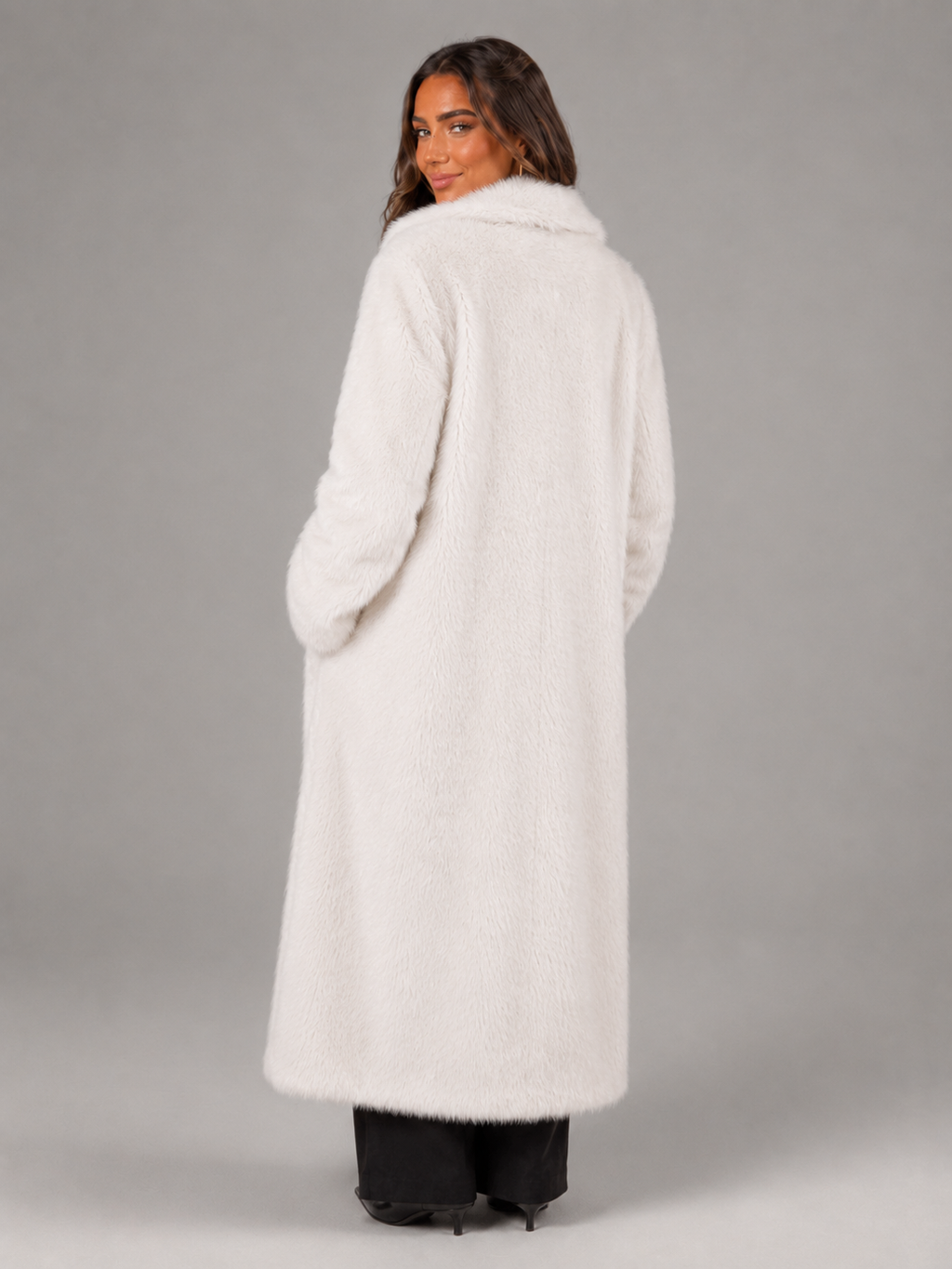 Women's full-length faux fur coat with a notch collar