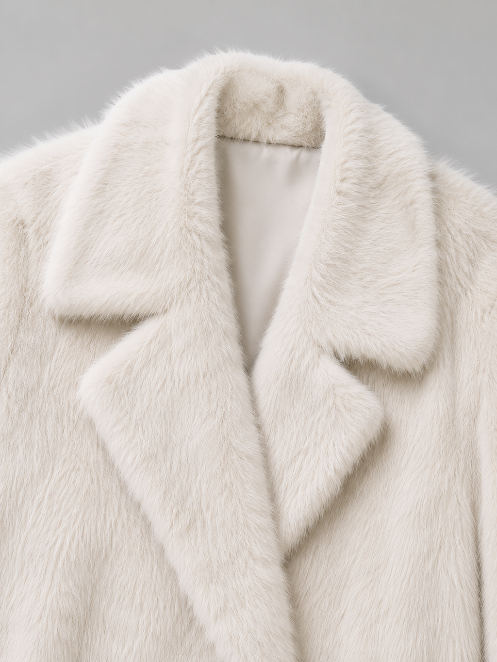 Women's full-length faux fur coat with a notch collar