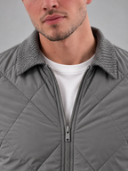 Men's diamond quilted bomber jacket with point collar