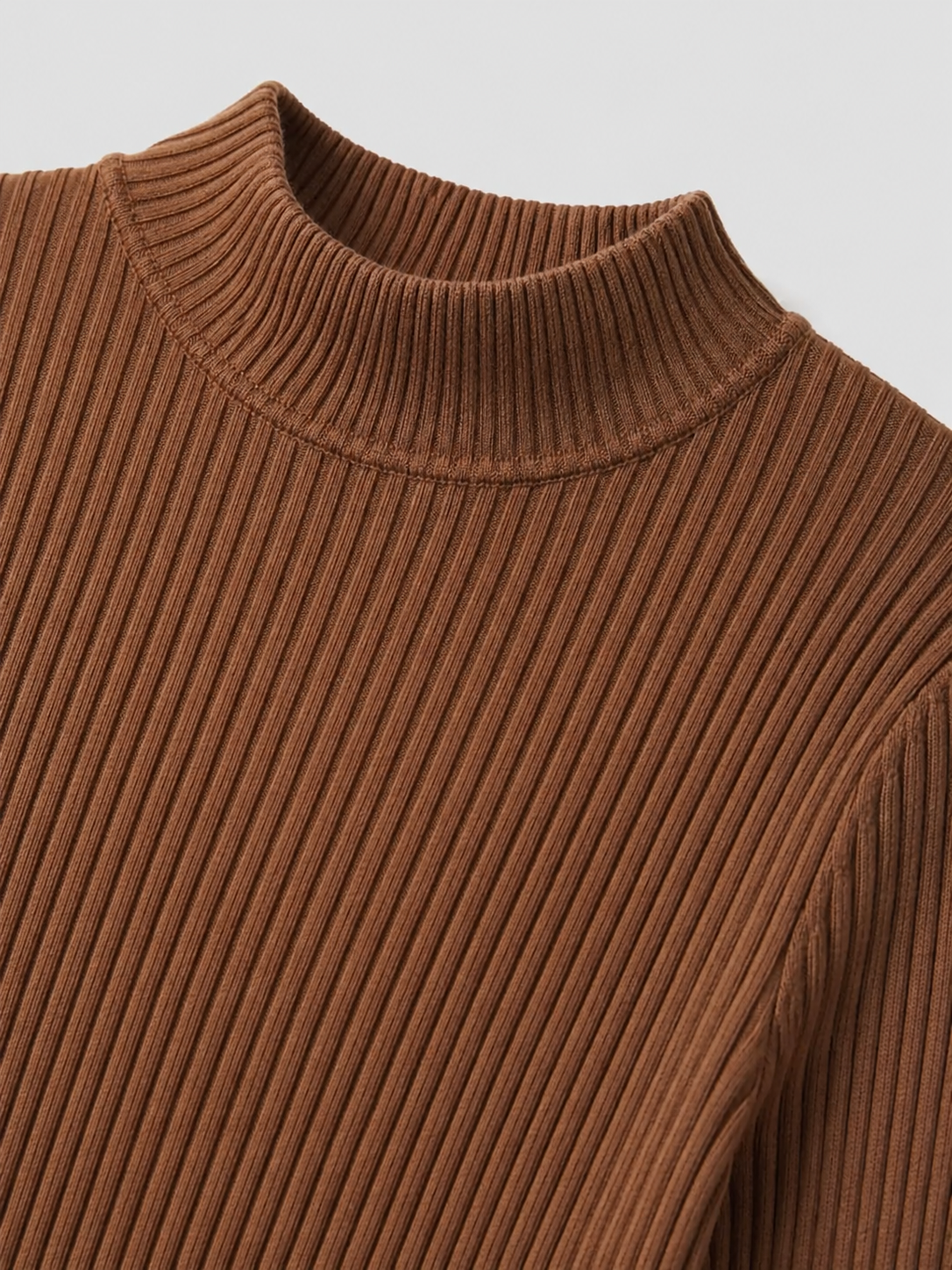 Women's long-sleeve ribbed knit top with a mock neck