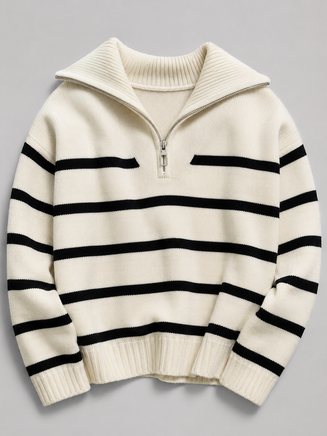 Women's striped knit jumper with a high neck and half zip