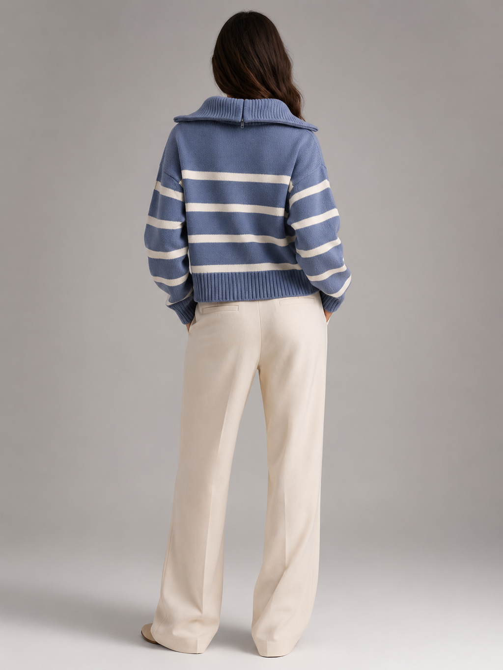 Women's striped knit jumper with a high neck and half zip