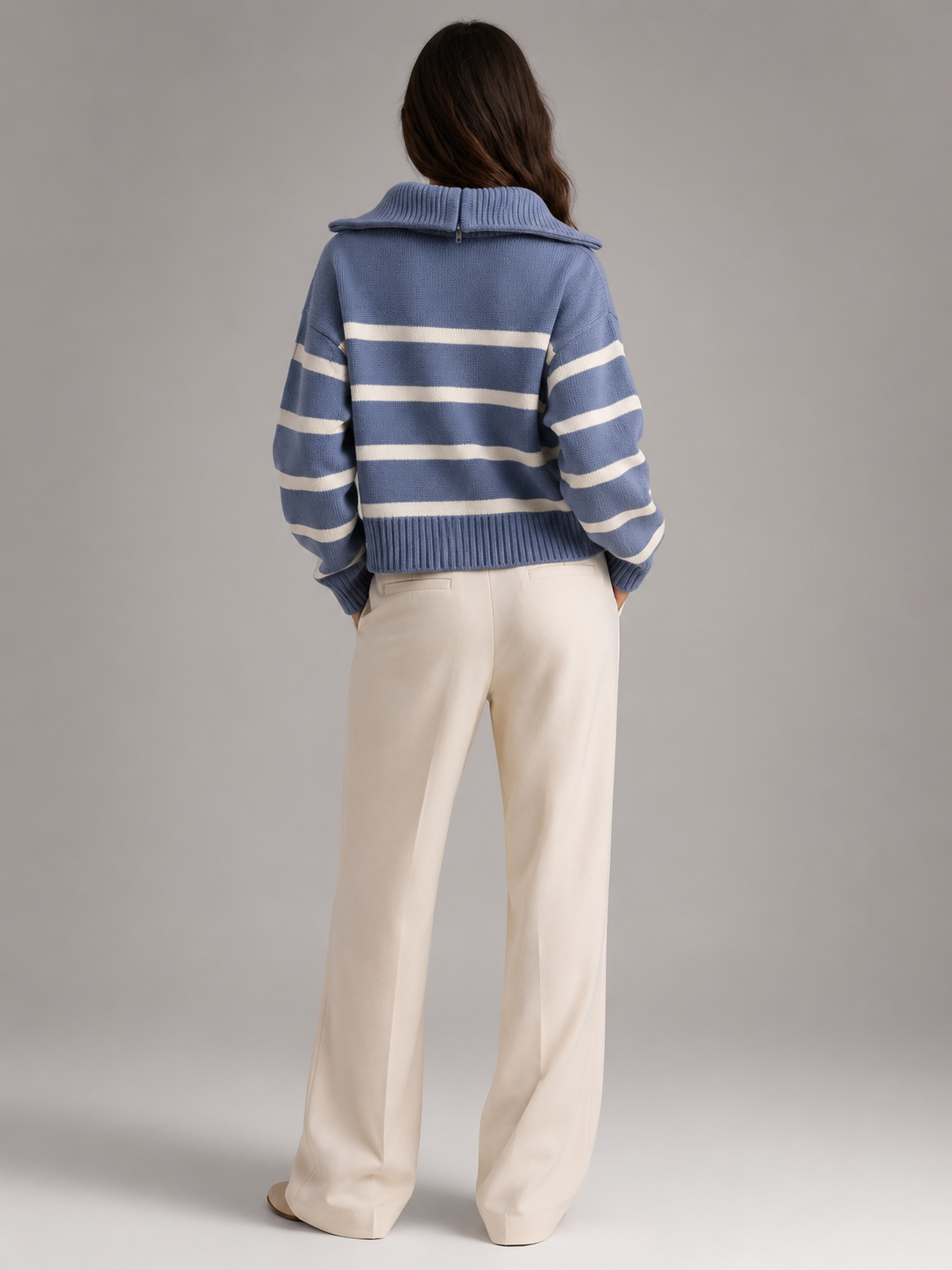 Women's striped knit jumper with a high neck and half zip