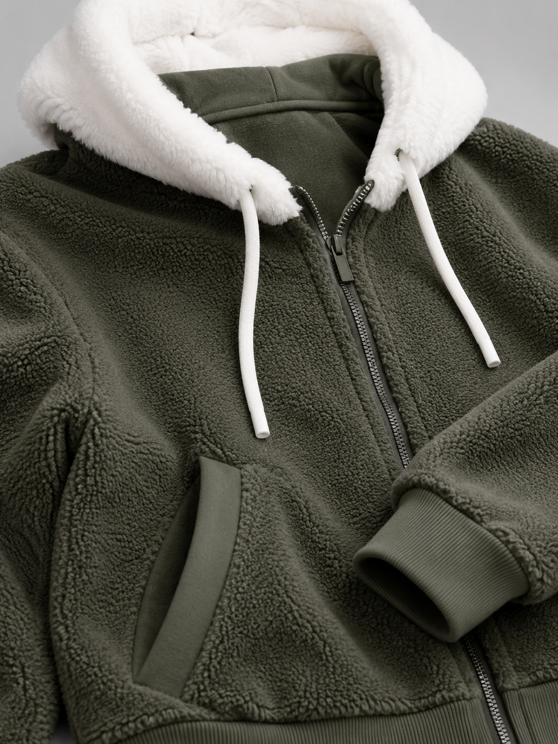 Women's sherpa-lined hooded padded jacket with a zip front
