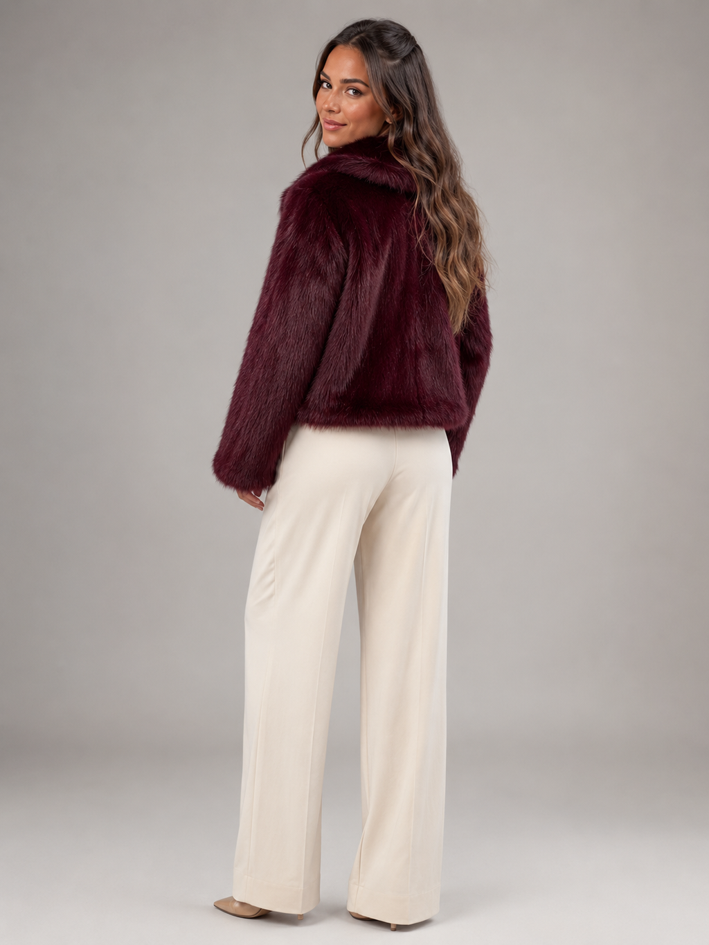 Women's cropped faux fur jacket with an open front