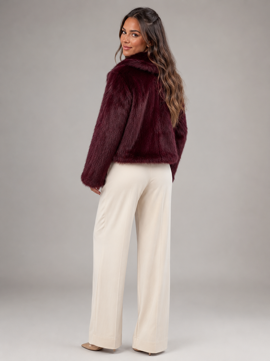 Women's cropped faux fur jacket with an open front