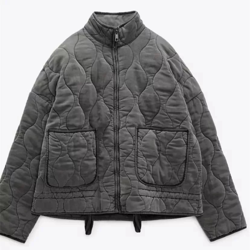 Women's high collar quilted jacket with patch pockets