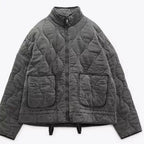 Women's high collar quilted jacket with patch pockets
