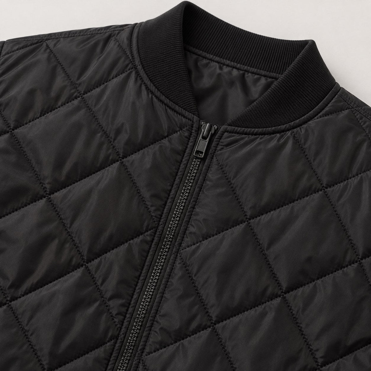 Men's Diamond Quilted Bomber Jacket in Black | Upton – detail view