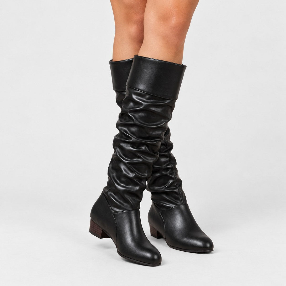 Women's slouchy knee-high boots in Black | Lydlinch – front view
