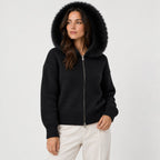 Women's zip-up knit cardigan with faux fur hood in Black | Kilnsey – side view