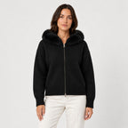 Women's zip-up knit cardigan with faux fur hood in Black | Kilnsey – front view