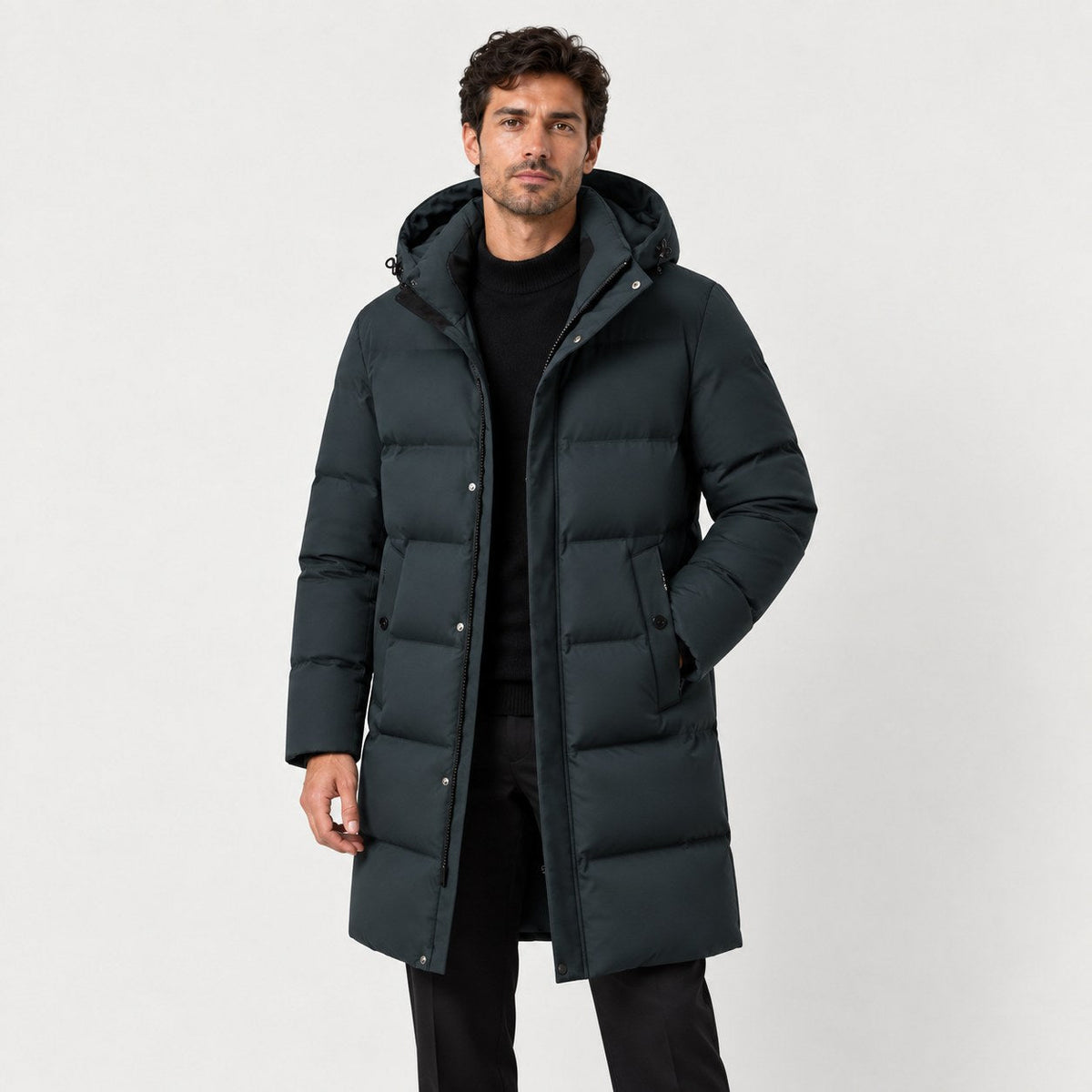 Men's longline hooded puffer coat in Dark Green | Rhossili – front view