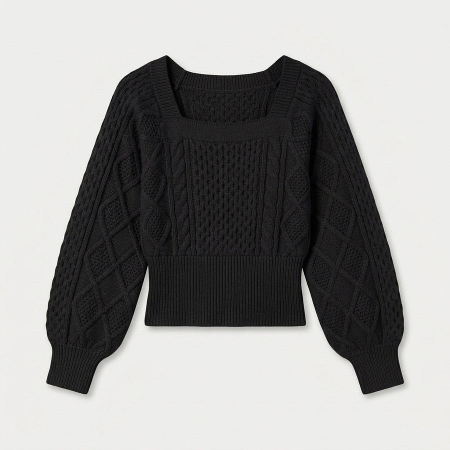 Women's cropped cable knit jumper with puff sleeves in Black | Ickleton – front view