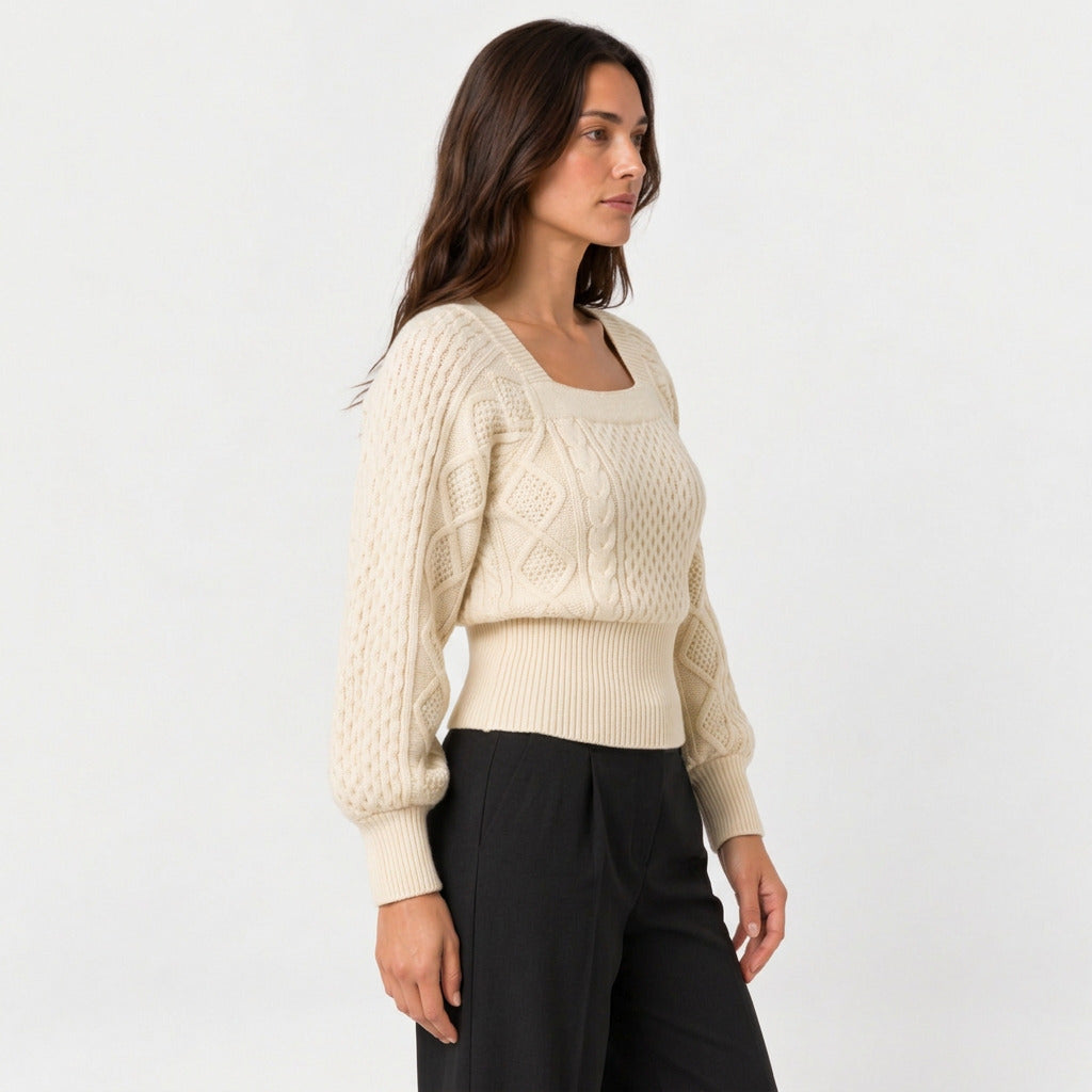 Women's cropped cable knit jumper with puff sleeves in Cream | Ickleton – side view