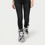 Women's fluffy faux fur boots in Black & White | Goadby – front view
