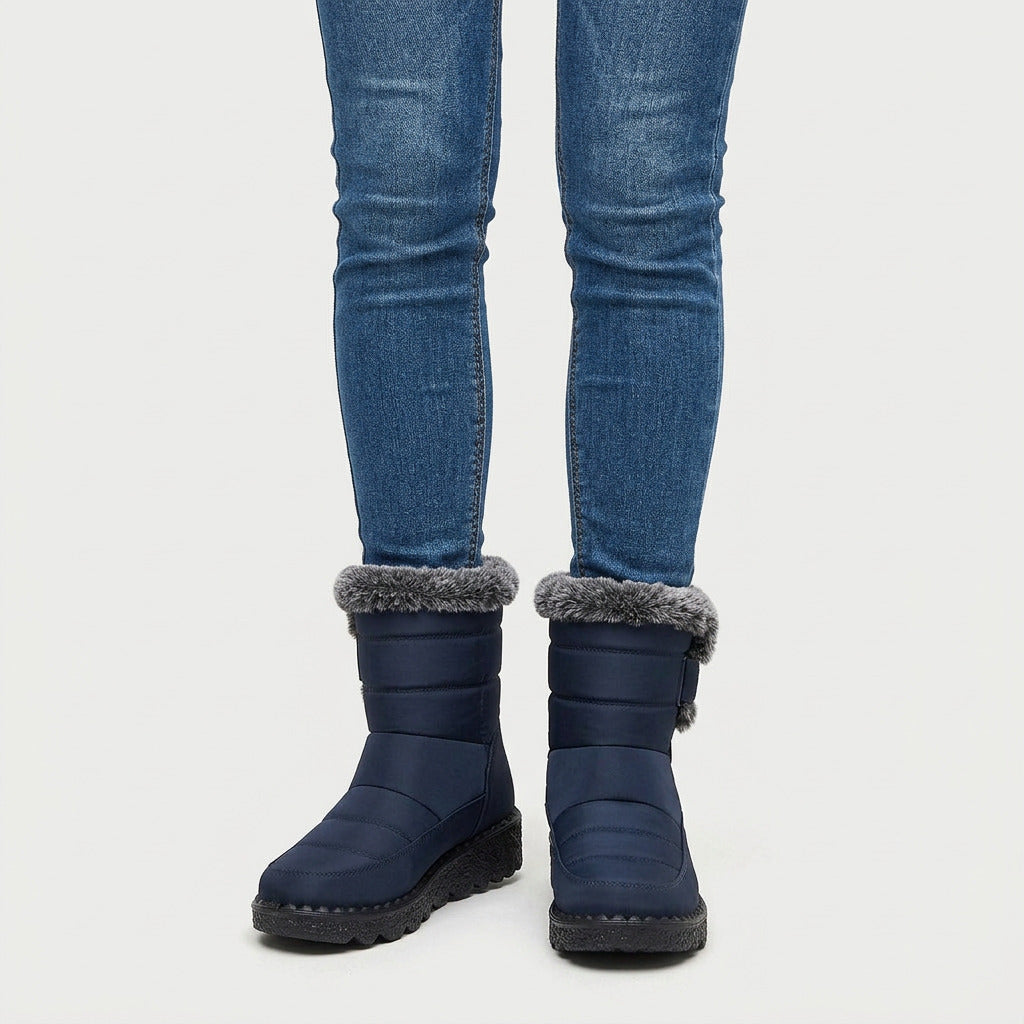 Women's faux fur collar snow boots in Navy | Kimmeridge – front view
