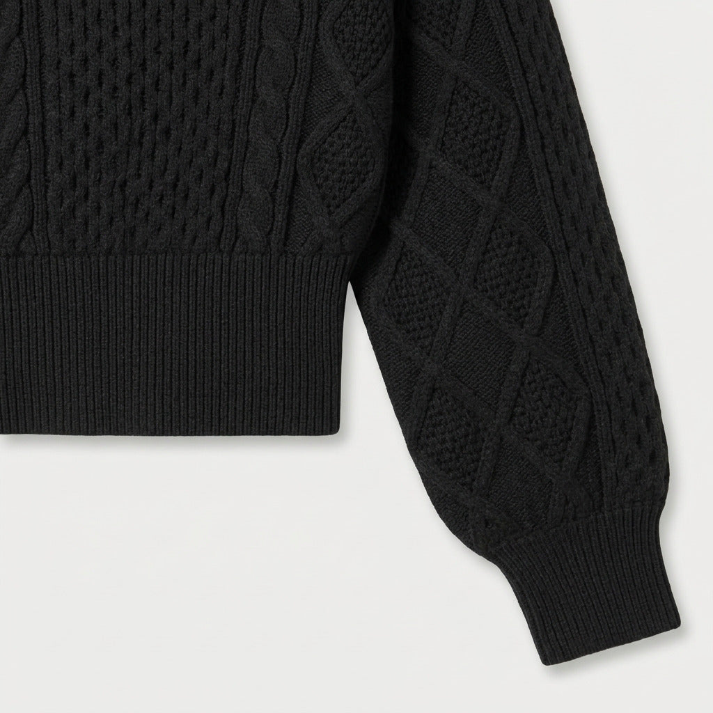 Women's cropped cable knit jumper with puff sleeves in Black | Ickleton – detail view